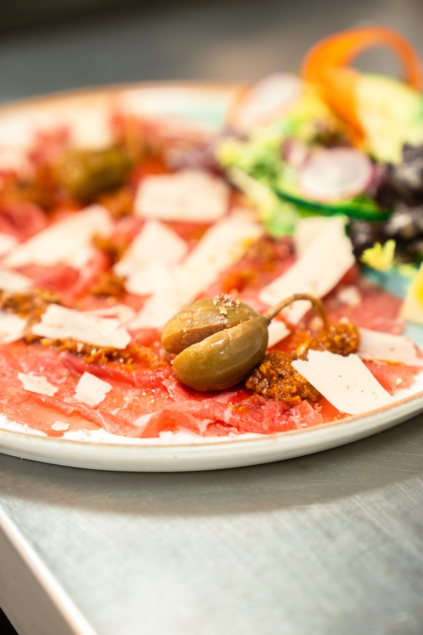 Beef carpaccio with capers and parmesan